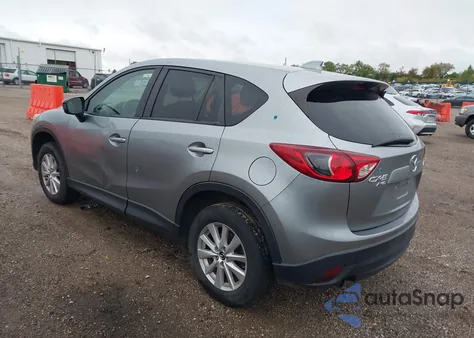 2014 Mazda Cx-5 Touring z USA, uszkodzony, nr VIN JM3KE4CY9E0366685
